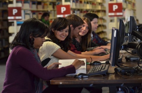 Students study in the Auraria Library, image source @ CU Digital Assets