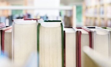 books lined up on a shelf