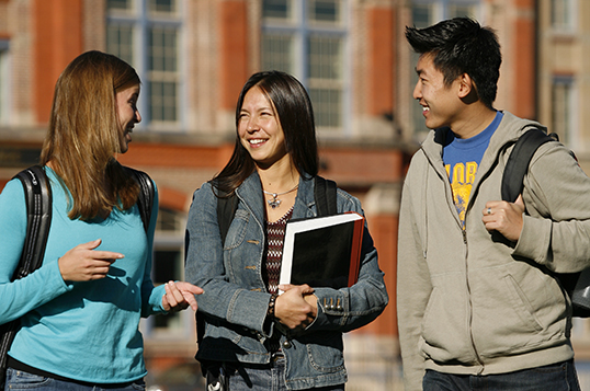 Students walking her Tivoli building