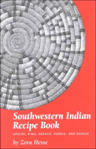 Red book cover featuring a detailed black-and-white woven basket spiral; titled “Southwestern Indian Recipe Book” by Zora Hesse.