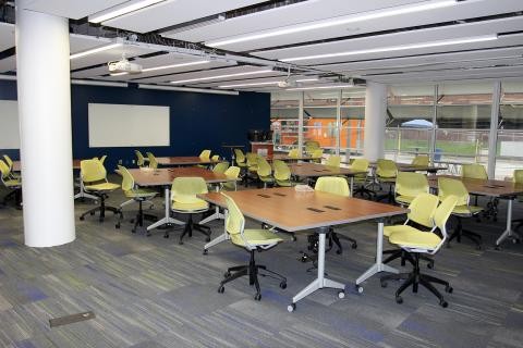 ELC classroom receiving it's final touches. Photo by: Jane Hood Photograph of the ELC classroom with new desks and chairs, the final touches prior to its opening.