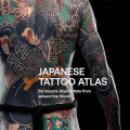 Upper body of a person covered in vibrant Japanese-style tattoos featuring traditional figures and a snake. Text reads "Japanese Tattoo Atlas." Bold and artistic tone.