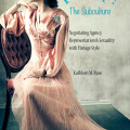 Elegant woman in vintage pink dress sits on antique chair in a poised, contemplative pose. Text on the image reads “Pin Up! The Subculture” by Kathleen M. Ryan, exploring themes of agency and sexuality.