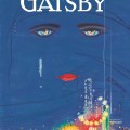 Cover of "The Great Gatsby" featuring abstract blue face with striking eyes and red lips, illuminated city lights at the bottom.