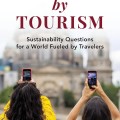 A traveler contemplates sustainability challenges in a bustling tourist destination, highlighting the impact of tourism on the environment.