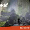 Person stands in cave taking a photo - GeoRef - Featured Database