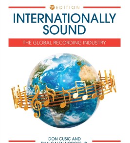 Cover of "Internationally Sound," 1st edition. A globe wrapped with gold musical notes, conveying the global reach of the recording industry.